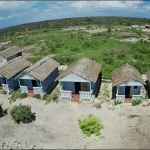 Aerial view of huts on beach